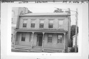 214 N WATER ST, a Federal house, built in Watertown, Wisconsin in 1868.