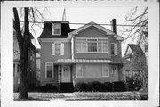 6114-6116 7TH AVE, a Second Empire house, built in Kenosha, Wisconsin in 1880.