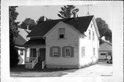 702 ELLIS, a Gabled Ell house, built in Kewaunee, Wisconsin in 1885.