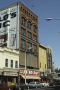 116 S 4TH ST, a Romanesque Revival large retail building, built in La Crosse, Wisconsin in 1884.