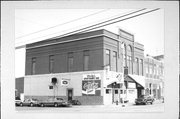 1544-1546 COMMERCIAL ST, a Romanesque Revival opera house/concert hall, built in Bangor, Wisconsin in 1899.