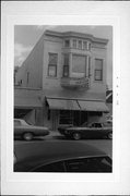 1218-1220 CALEDONIA ST, a Queen Anne retail building, built in La Crosse, Wisconsin in 1895.