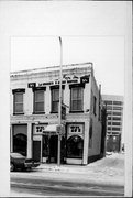 215 PEARL ST, a Commercial Vernacular retail building, built in La Crosse, Wisconsin in 1866.