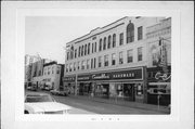 306-312 PEARL ST, a Romanesque Revival large retail building, built in La Crosse, Wisconsin in 1892.