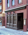 211 KING ST, a Commercial Vernacular small retail building, built in Madison, Wisconsin in 1869.