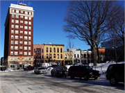 27 N PINCKNEY ST, a Romanesque Revival retail building, built in Madison, Wisconsin in 1897.