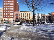 27 N PINCKNEY ST, a Romanesque Revival retail building, built in Madison, Wisconsin in 1897.