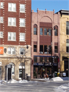 27 N PINCKNEY ST, a Romanesque Revival retail building, built in Madison, Wisconsin in 1897.