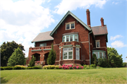 3046 W WISCONSIN AVE, a Arts and Crafts house, built in Milwaukee, Wisconsin in 1910.