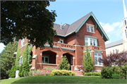 3046 W WISCONSIN AVE, a Arts and Crafts house, built in Milwaukee, Wisconsin in 1910.