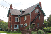 3046 W WISCONSIN AVE, a Arts and Crafts house, built in Milwaukee, Wisconsin in 1910.