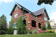 3046 W WISCONSIN AVE, a Arts and Crafts house, built in Milwaukee, Wisconsin in 1910.