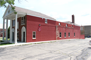 2001 W WISCONSIN AVE, a Colonial Revival/Georgian Revival funeral home, built in Milwaukee, Wisconsin in 1942.