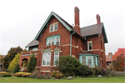 3046 W WISCONSIN AVE, a Arts and Crafts house, built in Milwaukee, Wisconsin in 1910.