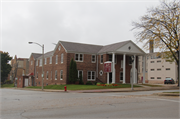 2001 W WISCONSIN AVE, a Colonial Revival/Georgian Revival funeral home, built in Milwaukee, Wisconsin in 1942.