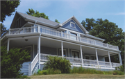 131 S PRAIRIE ST, a Queen Anne house, built in Stoughton, Wisconsin in 1906.