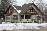 323 JEFFERSON AVE, a Craftsman house, built in Omro, Wisconsin in 1922.