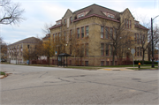 1130 Carlisle Ave., a Romanesque Revival elementary, middle, jr.high, or high, built in Racine, Wisconsin in 1890.