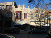 117 N ADAMS ST, a Commercial Vernacular small retail building, built in Green Bay, Wisconsin in 1900.