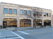 124-130 N ADAMS ST, a Spanish/Mediterranean Styles large retail building, built in Green Bay, Wisconsin in 1928.