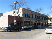 124-130 N ADAMS ST, a Spanish/Mediterranean Styles large retail building, built in Green Bay, Wisconsin in 1928.