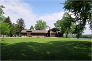 Dr Adolf and Helga Gundersen Cottage, a Building.