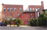 73-85 E MAIN ST, a Italianate large retail building, built in Platteville, Wisconsin in 1898.