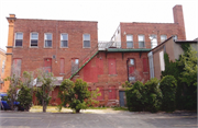 73-85 E MAIN ST, a Italianate retail building, built in Platteville, Wisconsin in 1898.