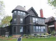1228 SHERMAN AVE, a Queen Anne house, built in Madison, Wisconsin in 1895.