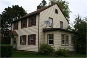 806 4TH AVE W, a Colonial Revival/Georgian Revival house, built in Ashland, Wisconsin in 1935.