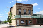 118 S BROADWAY, a Commercial Vernacular retail building, built in De Pere, Wisconsin in 1885.