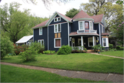 1303 MAIN ST E, a Queen Anne house, built in Menomonie, Wisconsin in 1880.