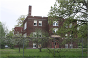 710 11TH ST E, a Late Gothic Revival elementary, middle, jr.high, or high, built in Menomonie, Wisconsin in 1925.