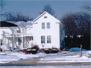12810 W HAMPTON AVE, a Greek Revival house, built in Butler, Wisconsin in 1850.