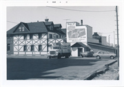 600-616 E OGDEN AVE, a English Revival Styles large retail building, built in Milwaukee, Wisconsin in 1935.