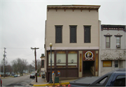 21 E MAIN ST, a Boomtown retail building, built in Evansville, Wisconsin in 1876.