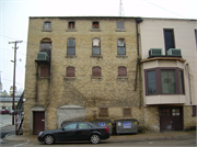 21 E MAIN ST, a Boomtown retail building, built in Evansville, Wisconsin in 1876.