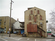 21 E MAIN ST, a Boomtown retail building, built in Evansville, Wisconsin in 1876.