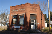 W5630 OAK HILL RD, a Commercial Vernacular bank/financial institution, built in Trego, Wisconsin in 1910.