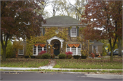 305 WISCONSIN AVE, a Colonial Revival/Georgian Revival house, built in Denmark, Wisconsin in 1930.