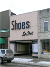 327 S CENTRAL AVE, a Commercial Vernacular retail building, built in Marshfield, Wisconsin in 1887.