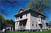 505 MAIN ST, a American Foursquare house, built in Wrightstown, Wisconsin in 1916.