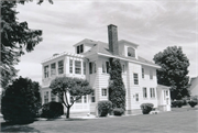 211 MAPLE ST, a Colonial Revival/Georgian Revival house, built in Peshtigo, Wisconsin in 1926.