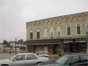 913-929 W EXCHANGE ST, a Early Gothic Revival large retail building, built in Brodhead, Wisconsin in 1869.
