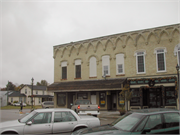 913-929 W EXCHANGE ST, a Early Gothic Revival retail building, built in Brodhead, Wisconsin in 1869.