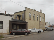 913-929 W EXCHANGE ST, a Early Gothic Revival large retail building, built in Brodhead, Wisconsin in 1869.