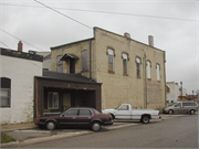 913-929 W EXCHANGE ST, a Early Gothic Revival retail building, built in Brodhead, Wisconsin in 1869.