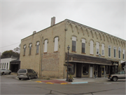 913-929 W EXCHANGE ST, a Early Gothic Revival retail building, built in Brodhead, Wisconsin in 1869.