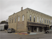 913-929 W EXCHANGE ST, a Early Gothic Revival large retail building, built in Brodhead, Wisconsin in 1869.