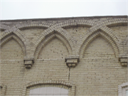 913-929 W EXCHANGE ST, a Early Gothic Revival retail building, built in Brodhead, Wisconsin in 1869.